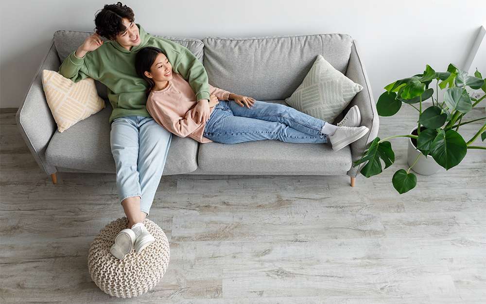 Couple lying on a sofa together